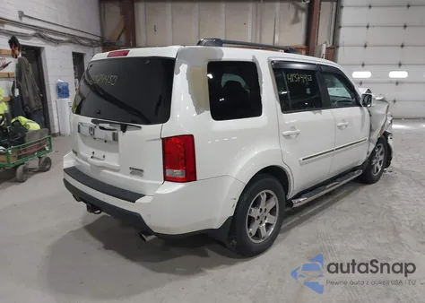 2011 Honda Pilot Touring z USA, uszkodzony, nr VIN 5FNYF4H93BB084167